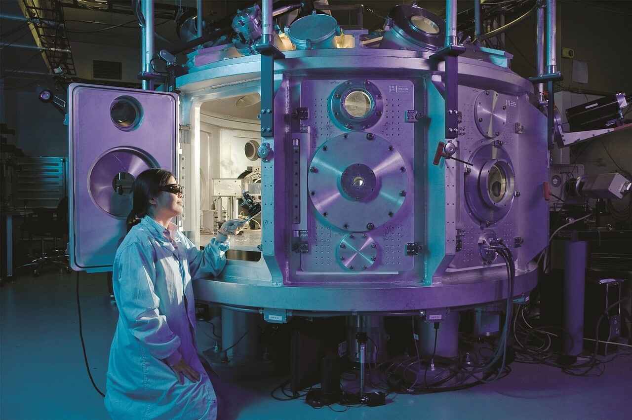 Image of a person and a machine
